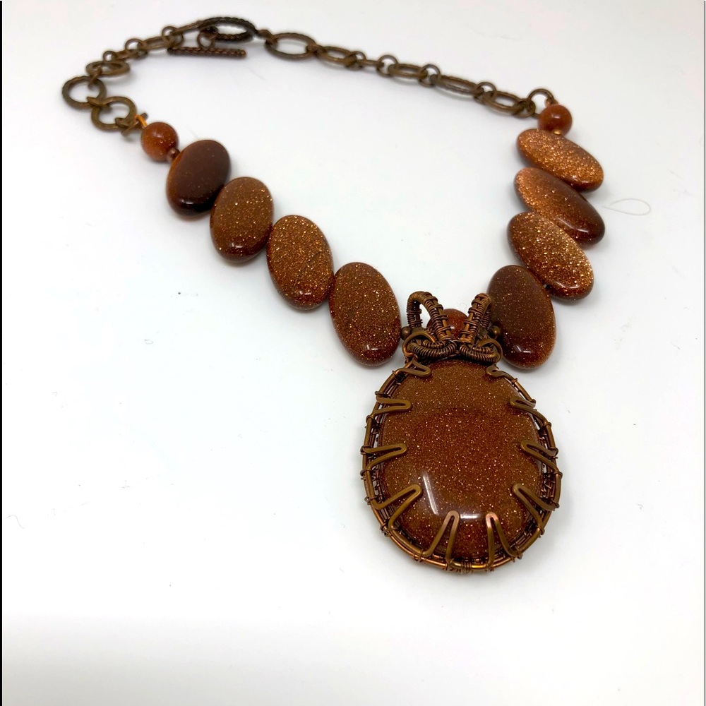 Wire-Wrapped Goldstone
ByZee of Zdartisan designs
